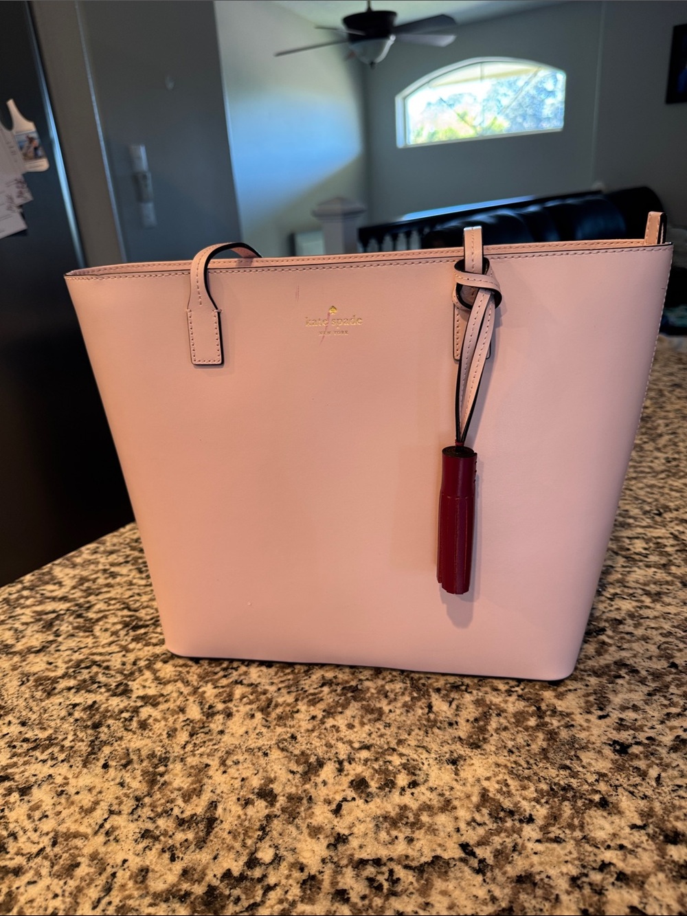 kate spade pale pink leather tote with burgundy tassel